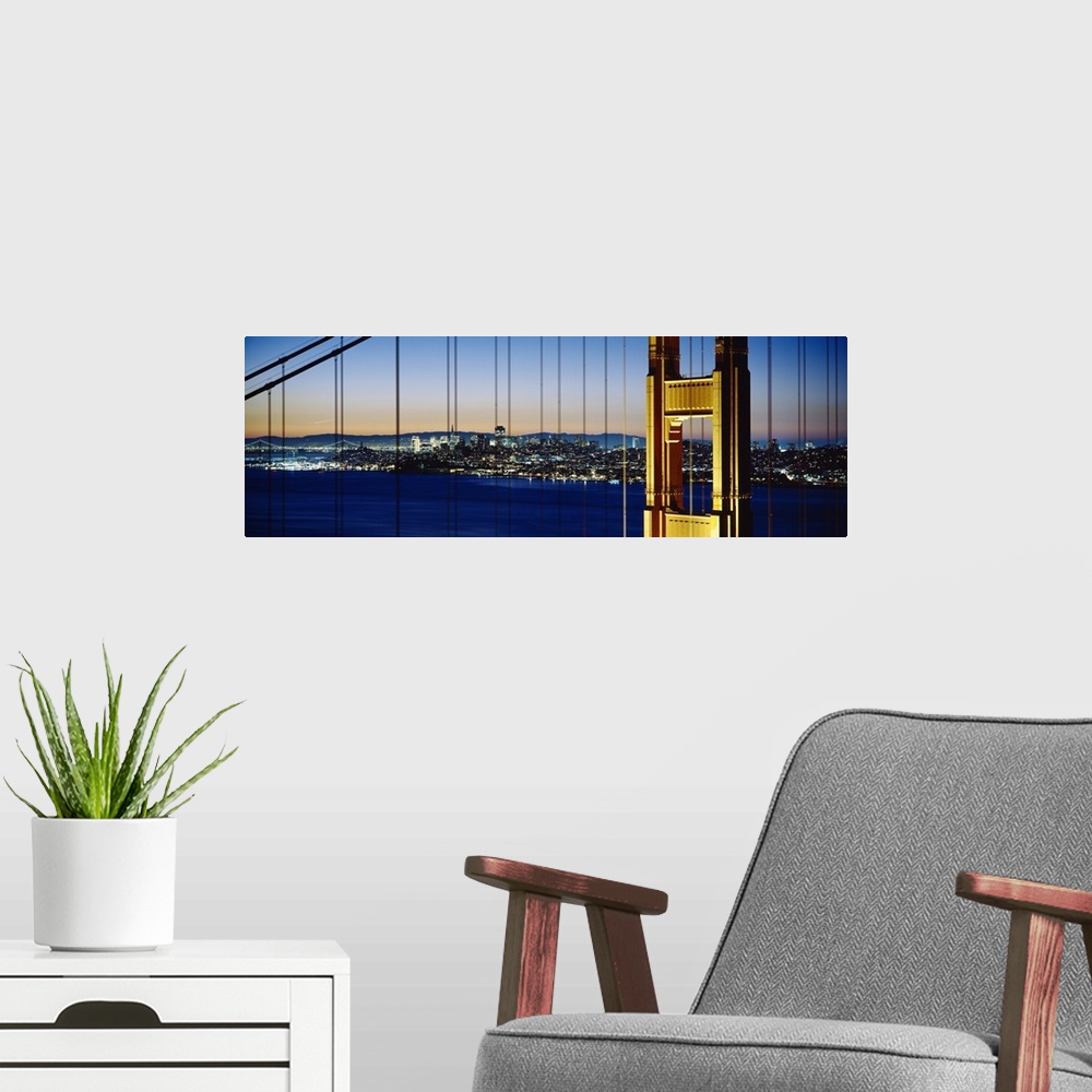 A modern room featuring Close-up of a bridge with a city in the background, Golden Gate Bridge, San Francisco, California