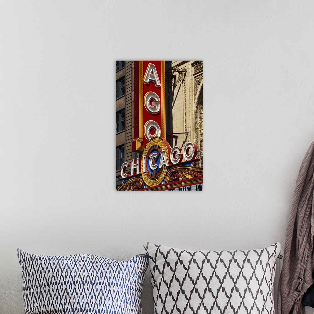 A bohemian room featuring Vertical photograph of the Chicago Theatre sign in the daytime.