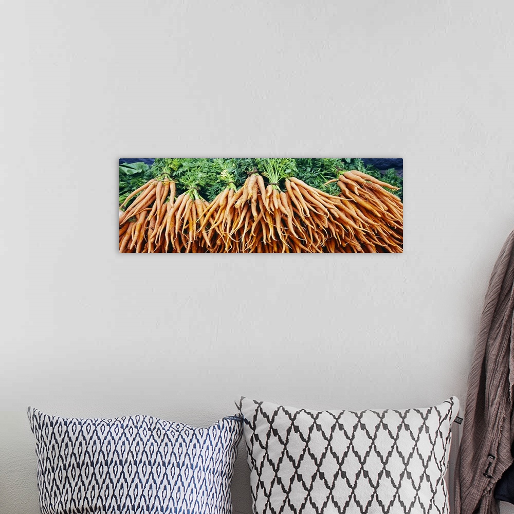 A bohemian room featuring Close-up of carrots at a market stall