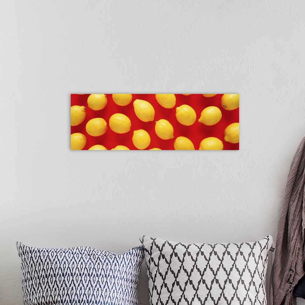 A bohemian room featuring Close-up of lemons on a red background