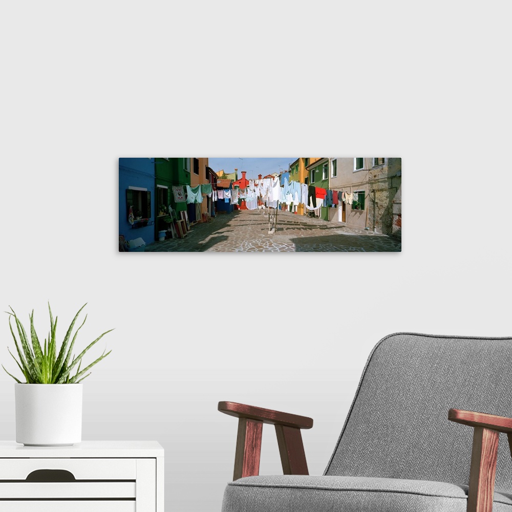 A modern room featuring Clothesline in a street, Burano, Veneto, Italy