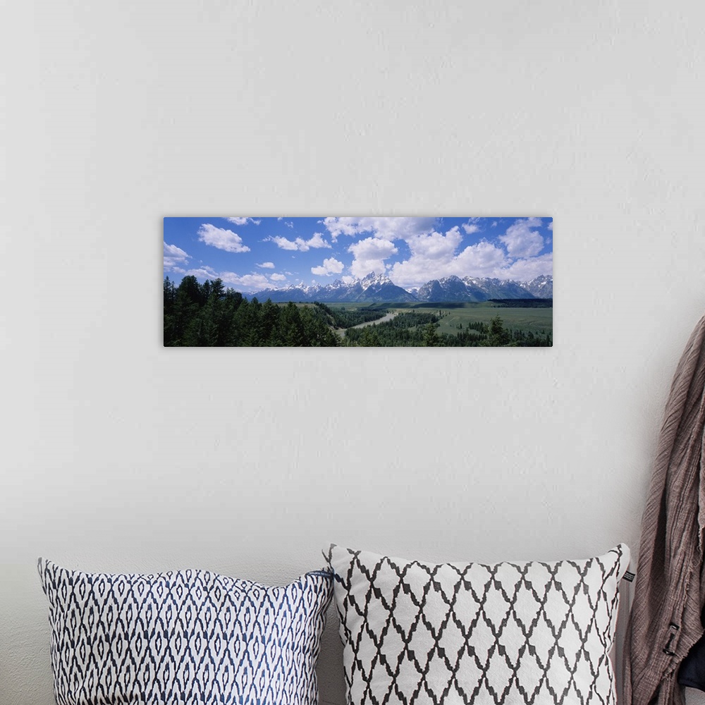 A bohemian room featuring Clouded sky over snow covered mountains, Grand Teton, Grand Teton National Park, Wyoming