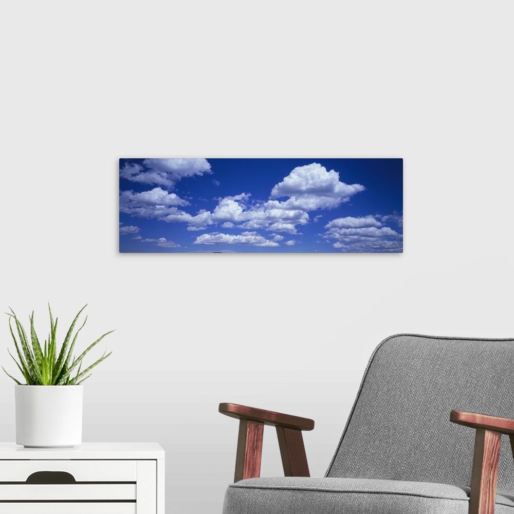 A modern room featuring Clouds