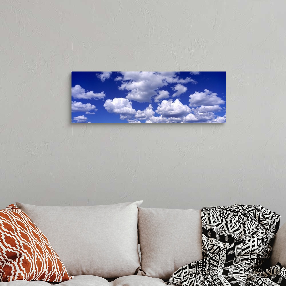 A bohemian room featuring Clouds