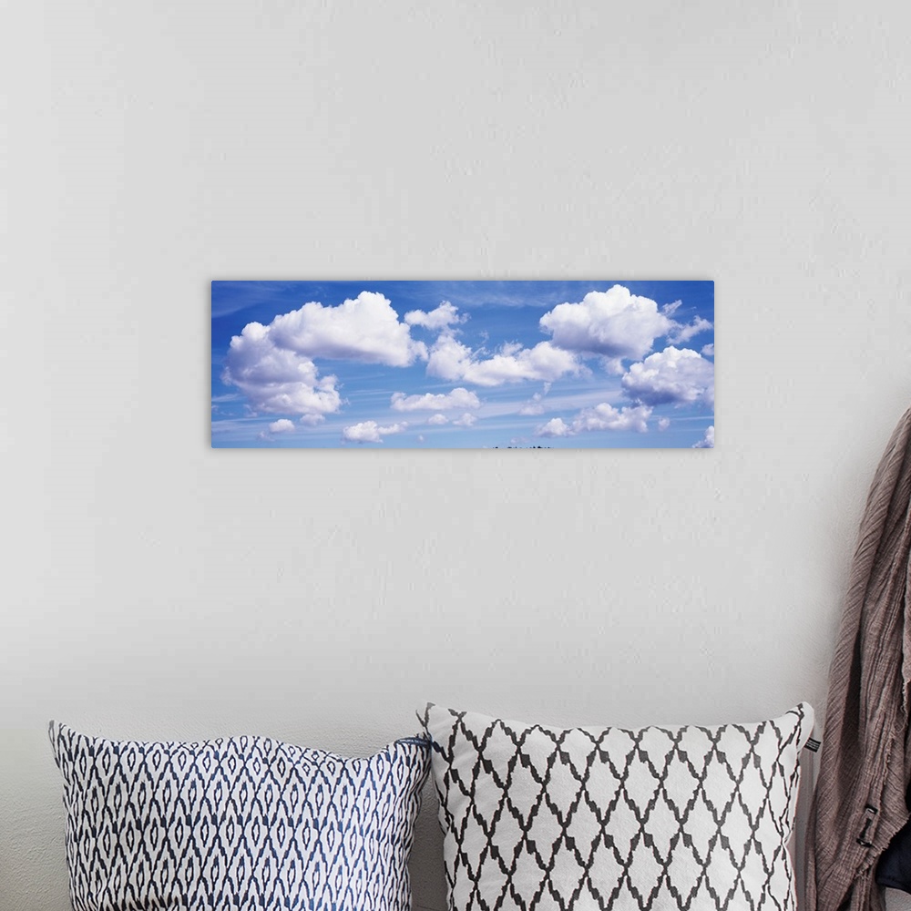 A bohemian room featuring clouds, cumulus