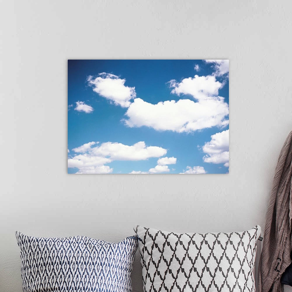 A bohemian room featuring Clouds in blue sky