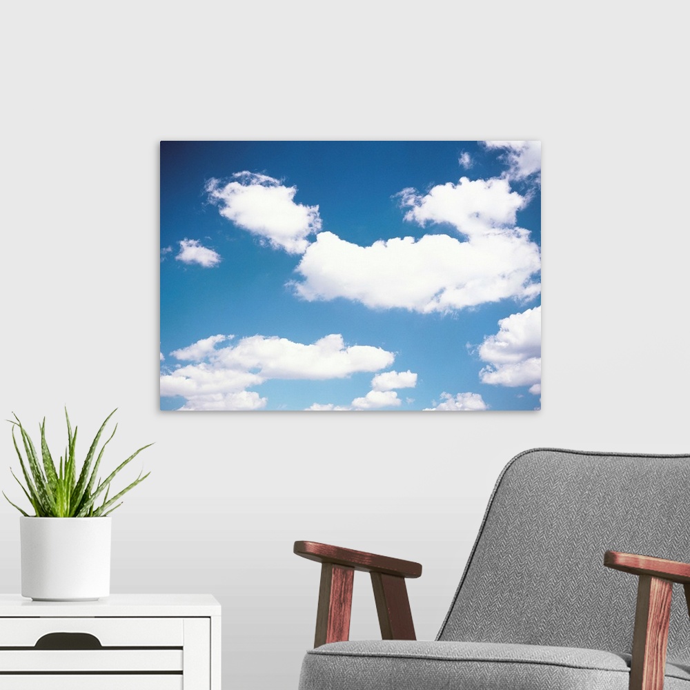 A modern room featuring Clouds in blue sky