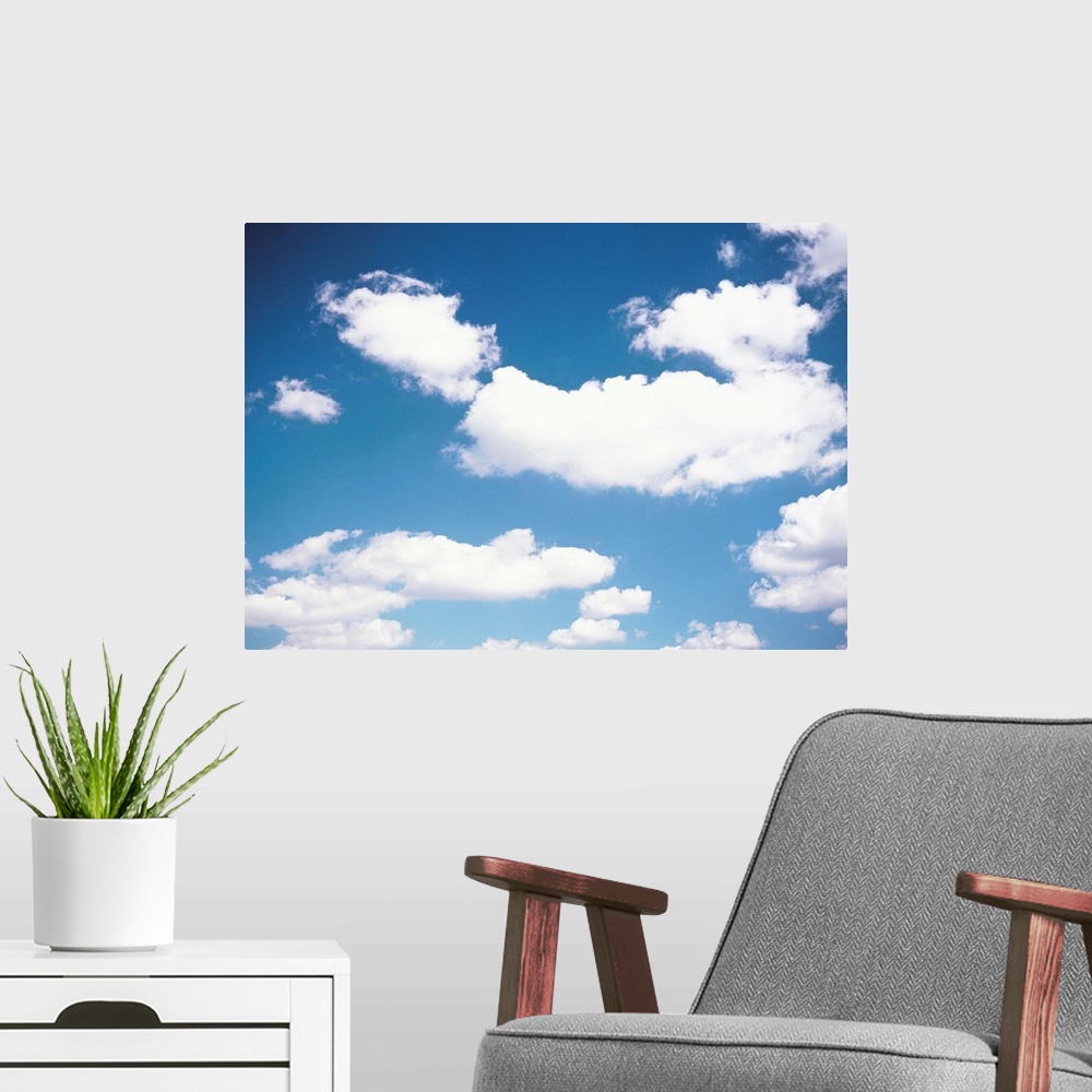 A modern room featuring Clouds in blue sky
