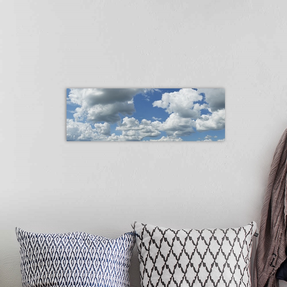 A bohemian room featuring Clouds in the sky