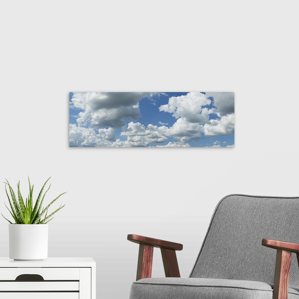 A modern room featuring Clouds in the sky