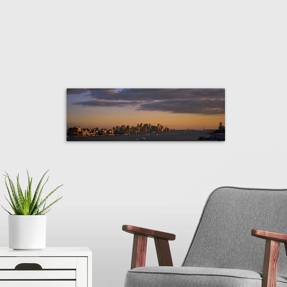 A modern room featuring Clouds over a city at dusk, Manhattan, New York City, New York State