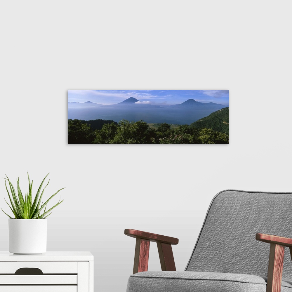A modern room featuring Clouds over a lake, Lake Atitlan, Guatemala