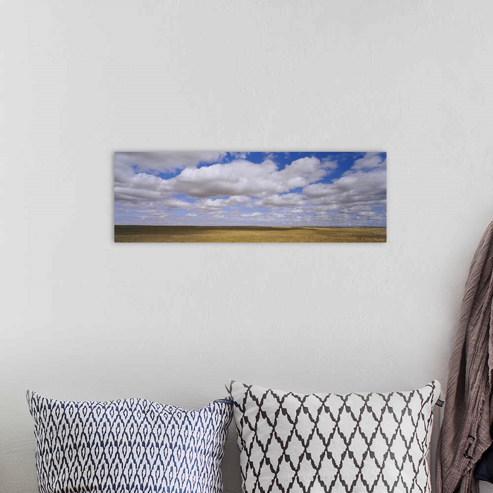 A bohemian room featuring Clouds over a landscape, North Dakota