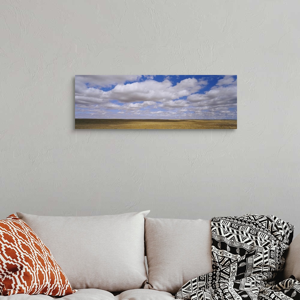A bohemian room featuring Clouds over a landscape, North Dakota
