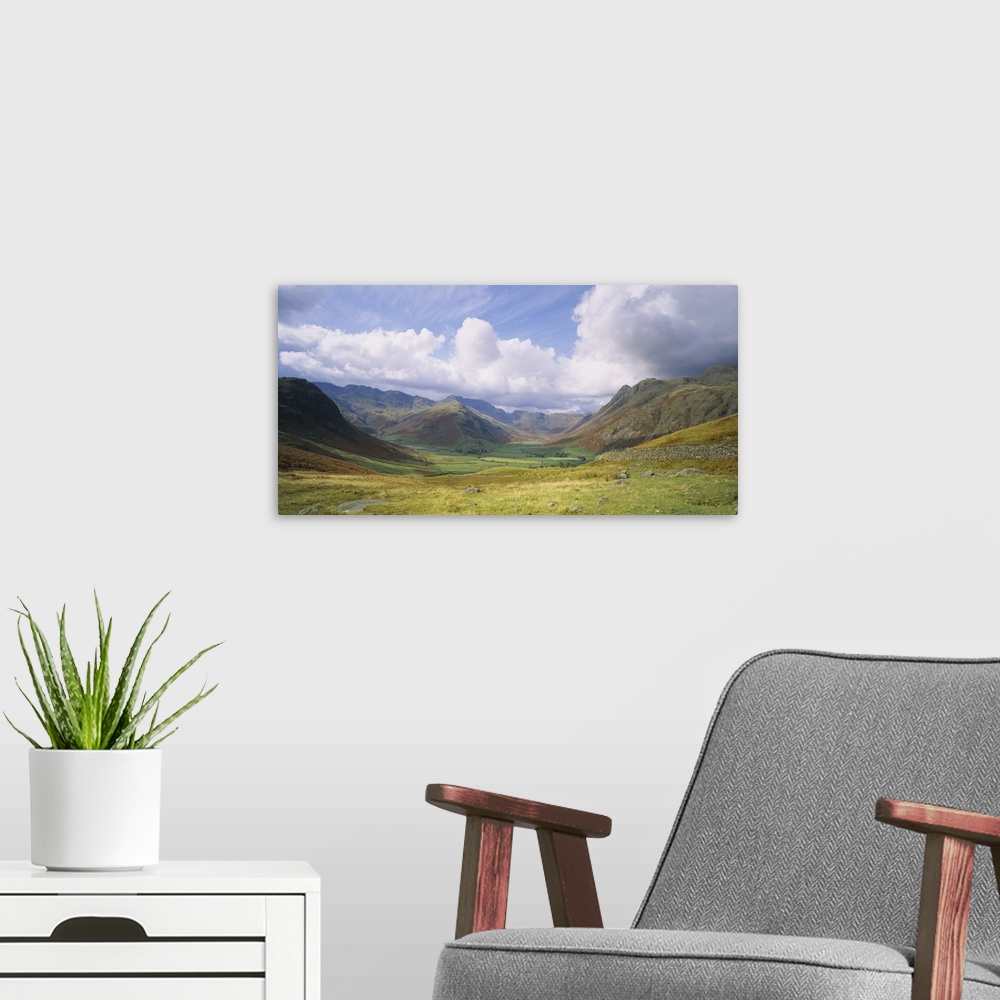 A modern room featuring Clouds over a landscape, Stool End, Langdale Fell, Cumbria, England