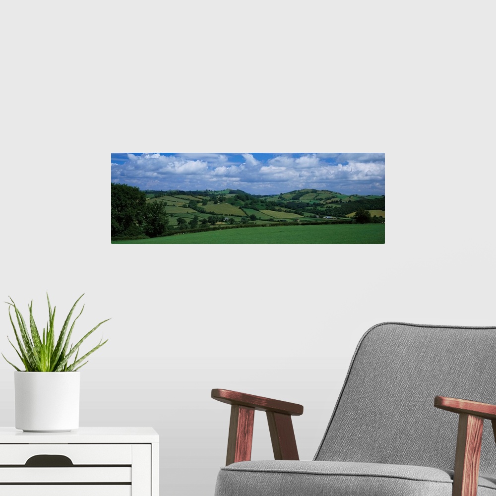 A modern room featuring Clouds over a landscape, Welsh Marches, Wales