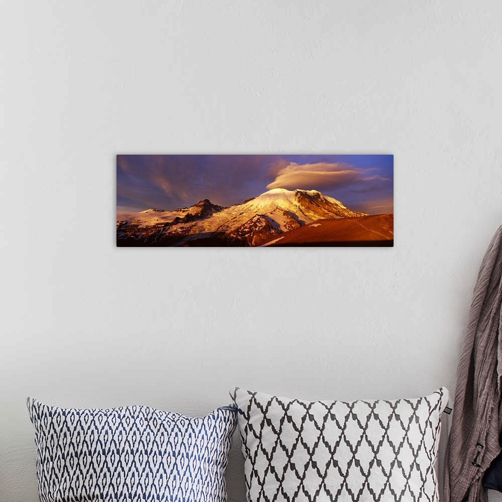 A bohemian room featuring Clouds over a mountain at dawn, Mt Rainier, Mt Rainier National Park, Washington State