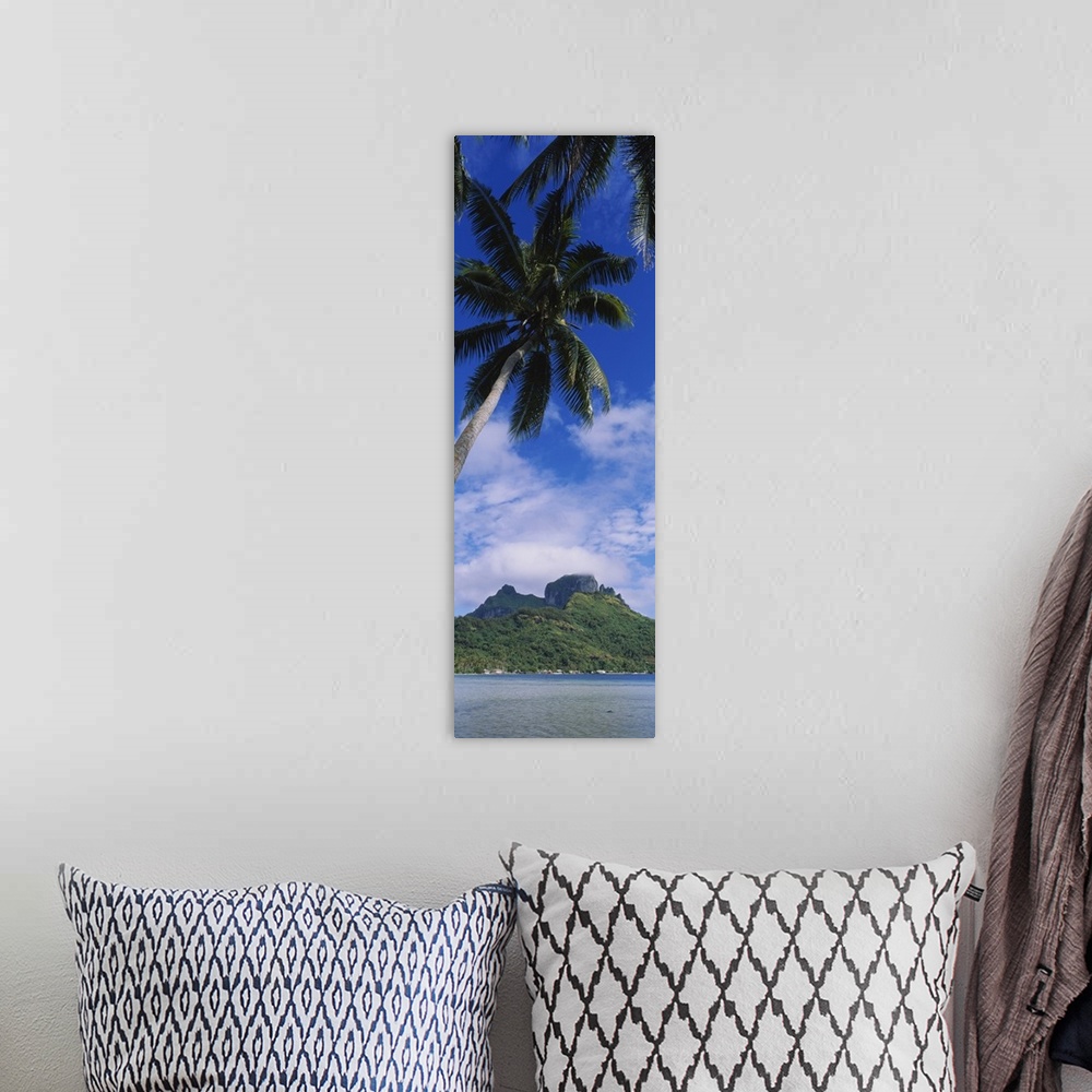 A bohemian room featuring Clouds over a mountain, Bora Bora, French Polynesia