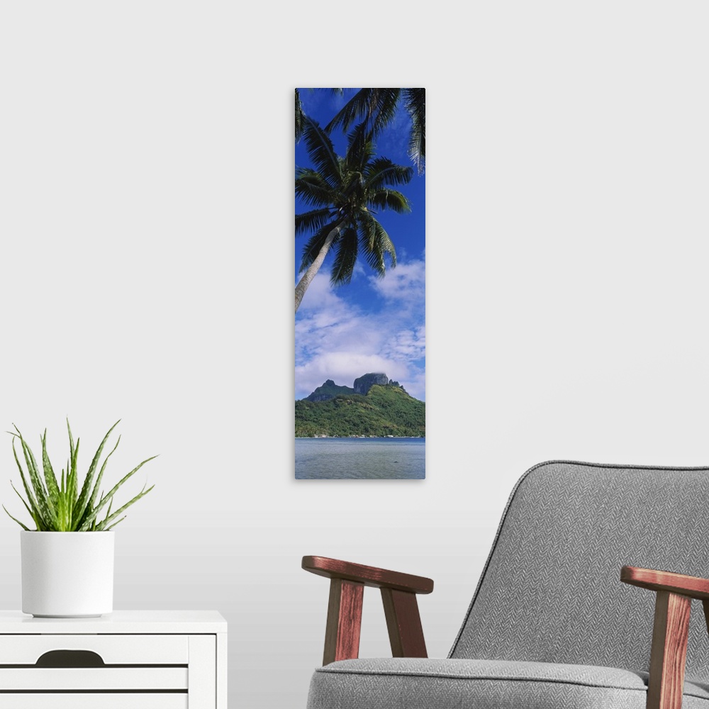 A modern room featuring Clouds over a mountain, Bora Bora, French Polynesia