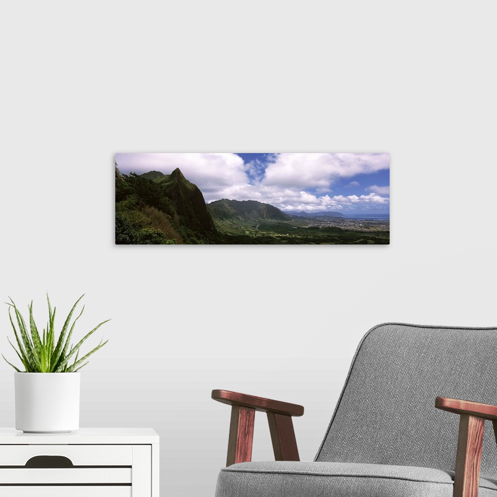 A modern room featuring Clouds over a mountain, Kaneohe, Oahu, Hawaii