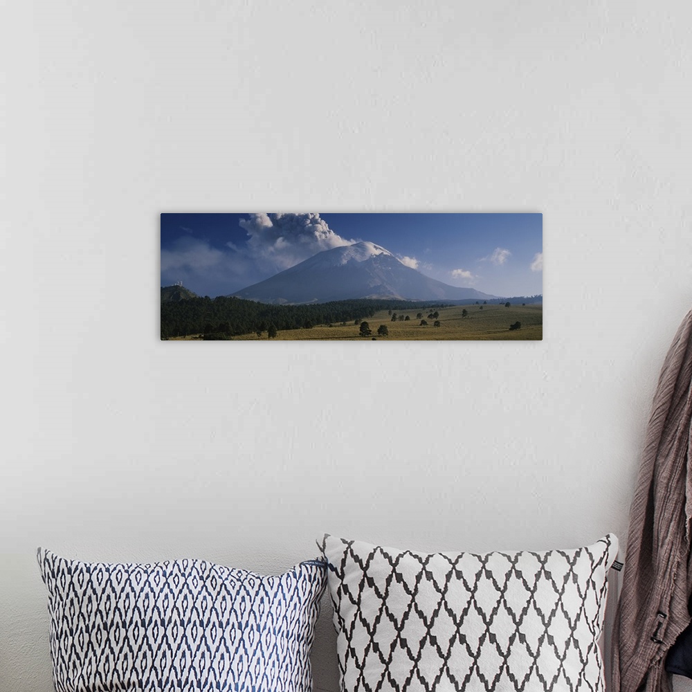 A bohemian room featuring Clouds over a mountain, Popocatepetl Volcano, Mexico