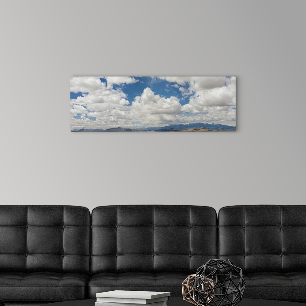 A modern room featuring Clouds over a mountain range, Ely, White Pine County, Nevada