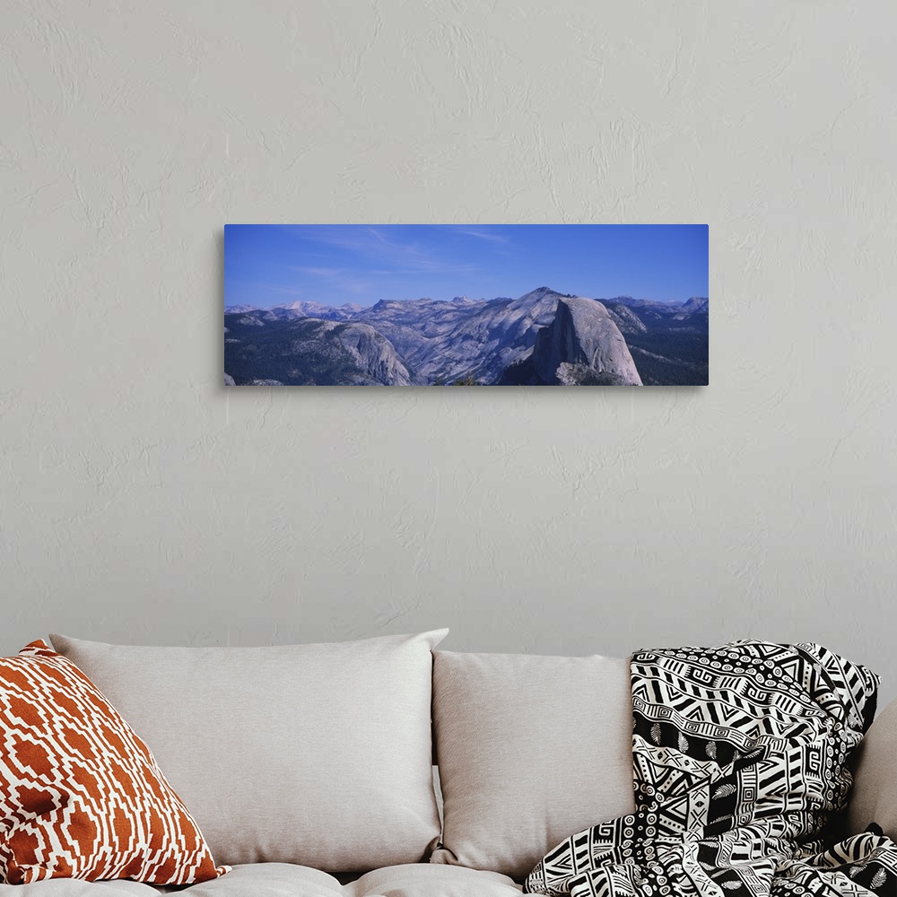 A bohemian room featuring Clouds over a mountain range, Yosemite National Park, California