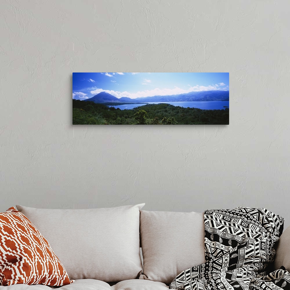 A bohemian room featuring Clouds over a volcano, Arenal Volcano, Costa Rica