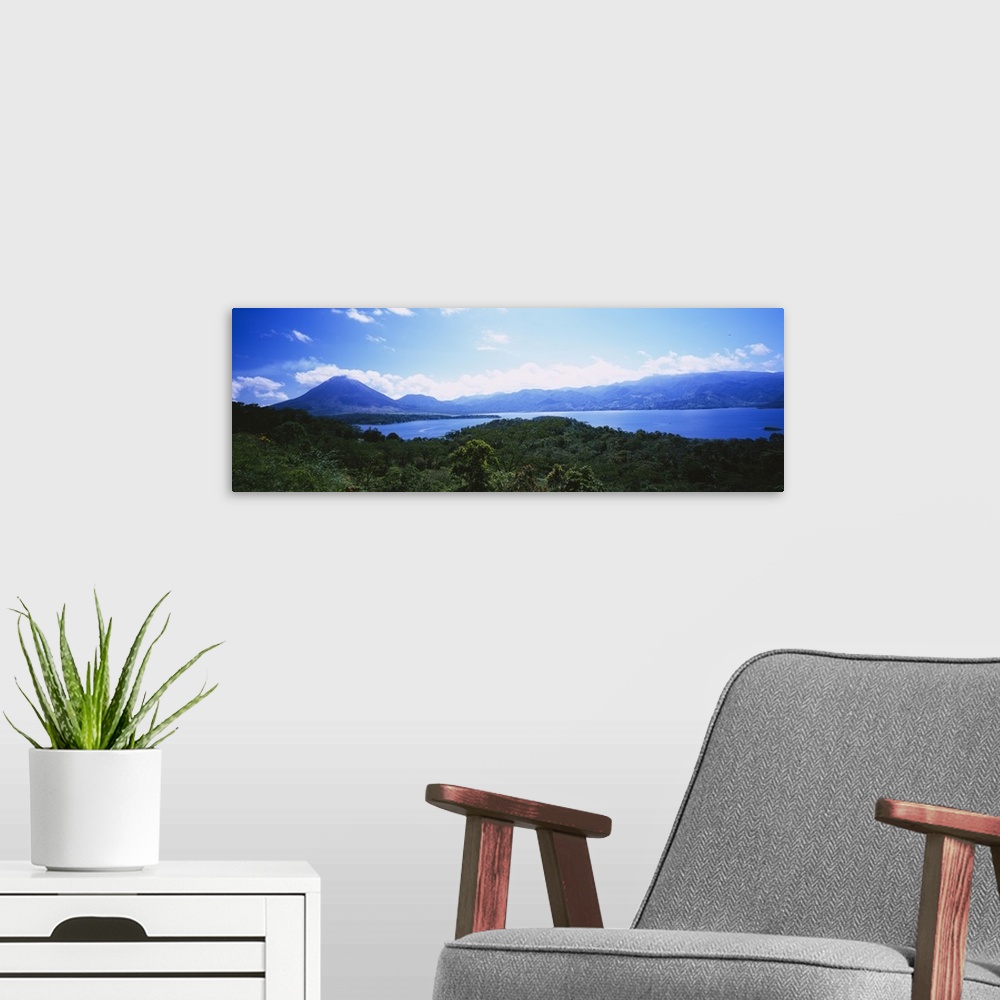 A modern room featuring Clouds over a volcano, Arenal Volcano, Costa Rica