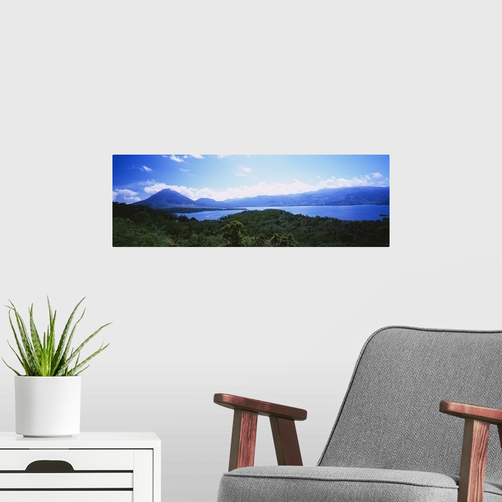 A modern room featuring Clouds over a volcano, Arenal Volcano, Costa Rica