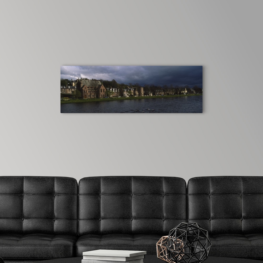 A modern room featuring Clouds over building on the waterfront, Inverness, Highlands, Scotland