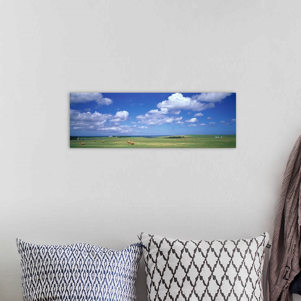 A bohemian room featuring Clouds over Farms Prince Edward Island Canada