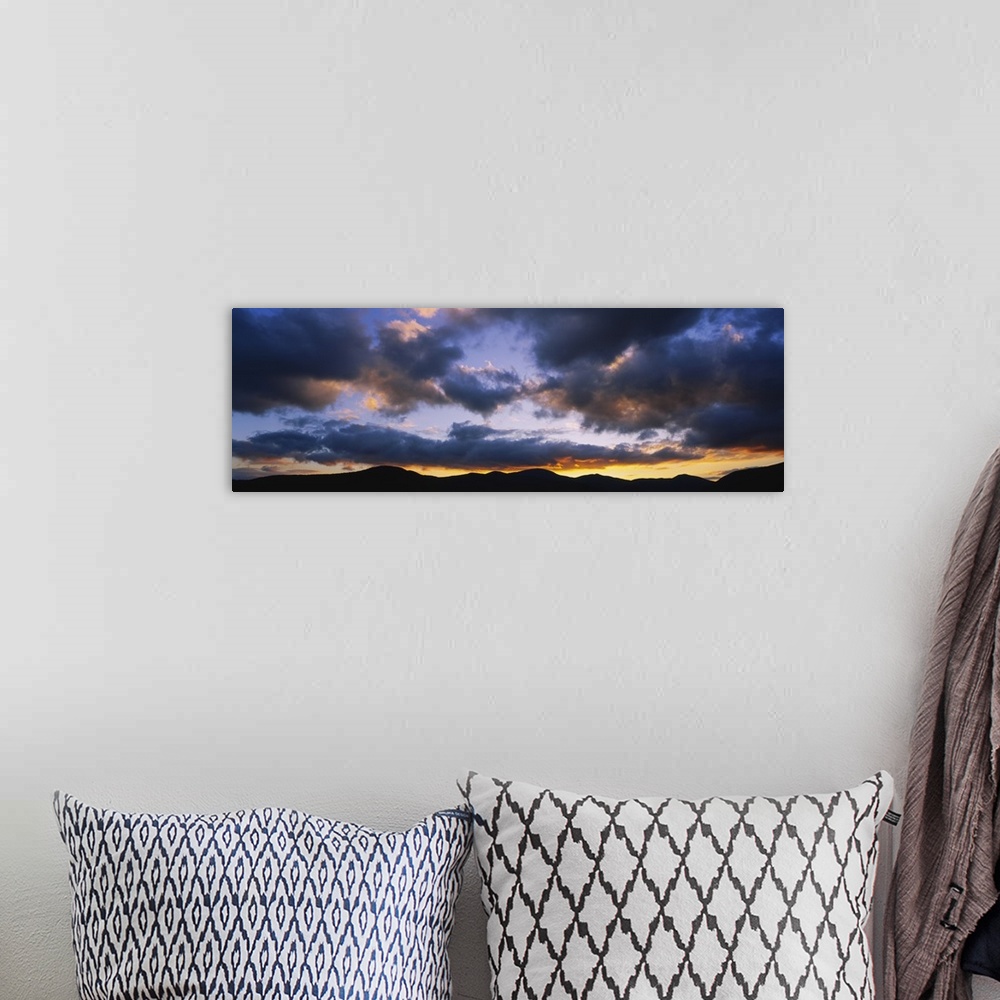 A bohemian room featuring Clouds over mountains at dusk, Stowe, Lamoille County, Vermont