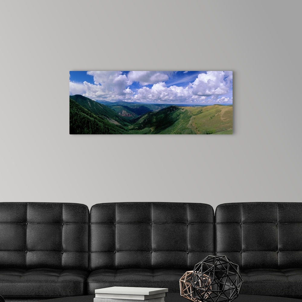 A modern room featuring Clouds over San Juan Mountains near Telluride CO