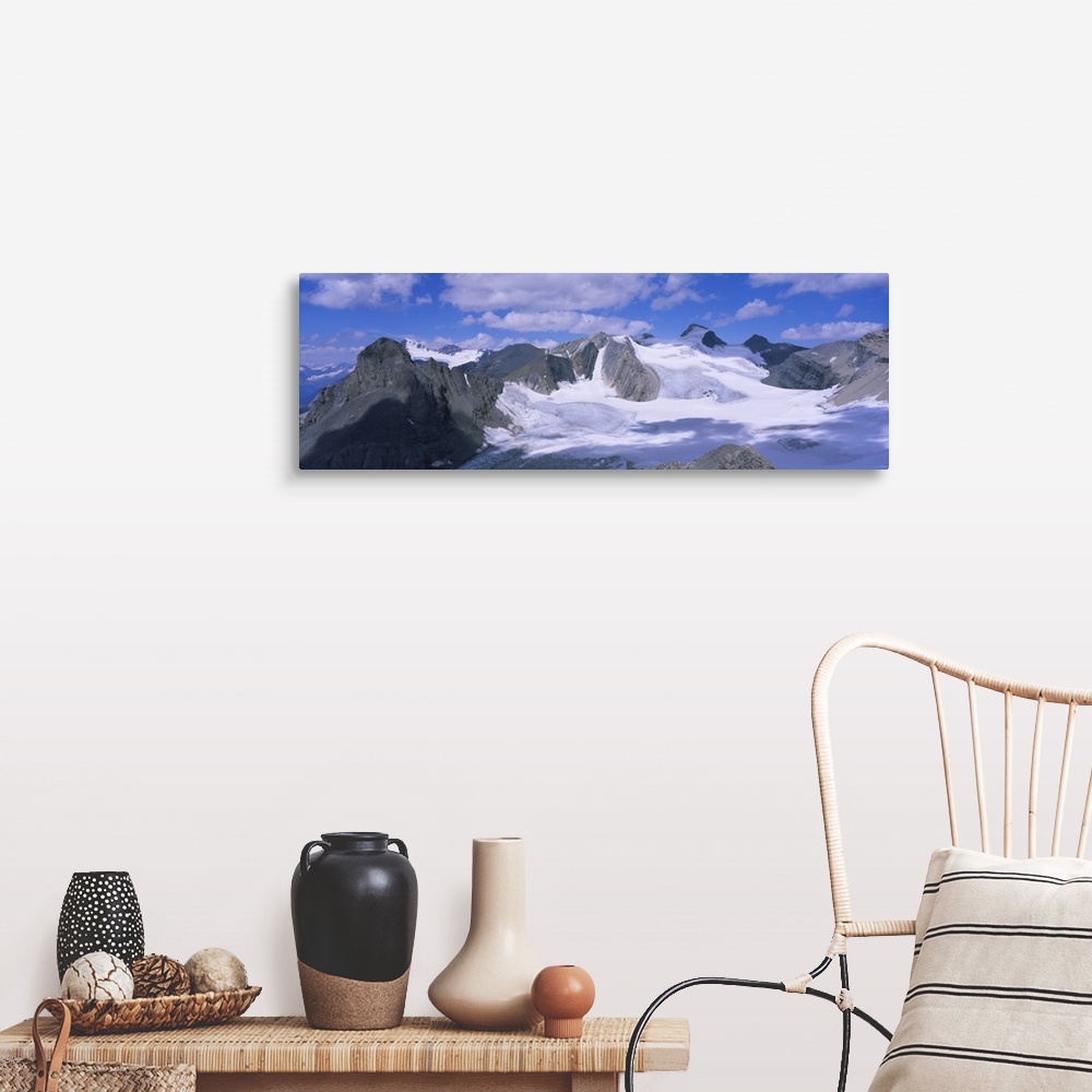 A farmhouse room featuring Clouds over snow covered mountains, Canadian Rockies, Banff National Park, British Columbia, Canada