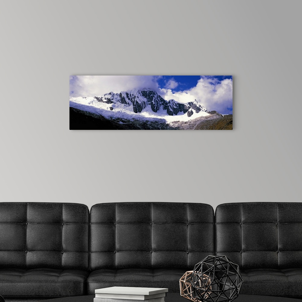 A modern room featuring Clouds over snowcapped Andes, Cusco Region, Peru, South America
