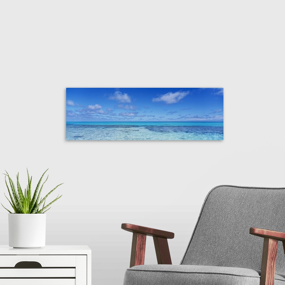 A modern room featuring Clouds over the Pacific Ocean, Rangiroa, French Polynesia