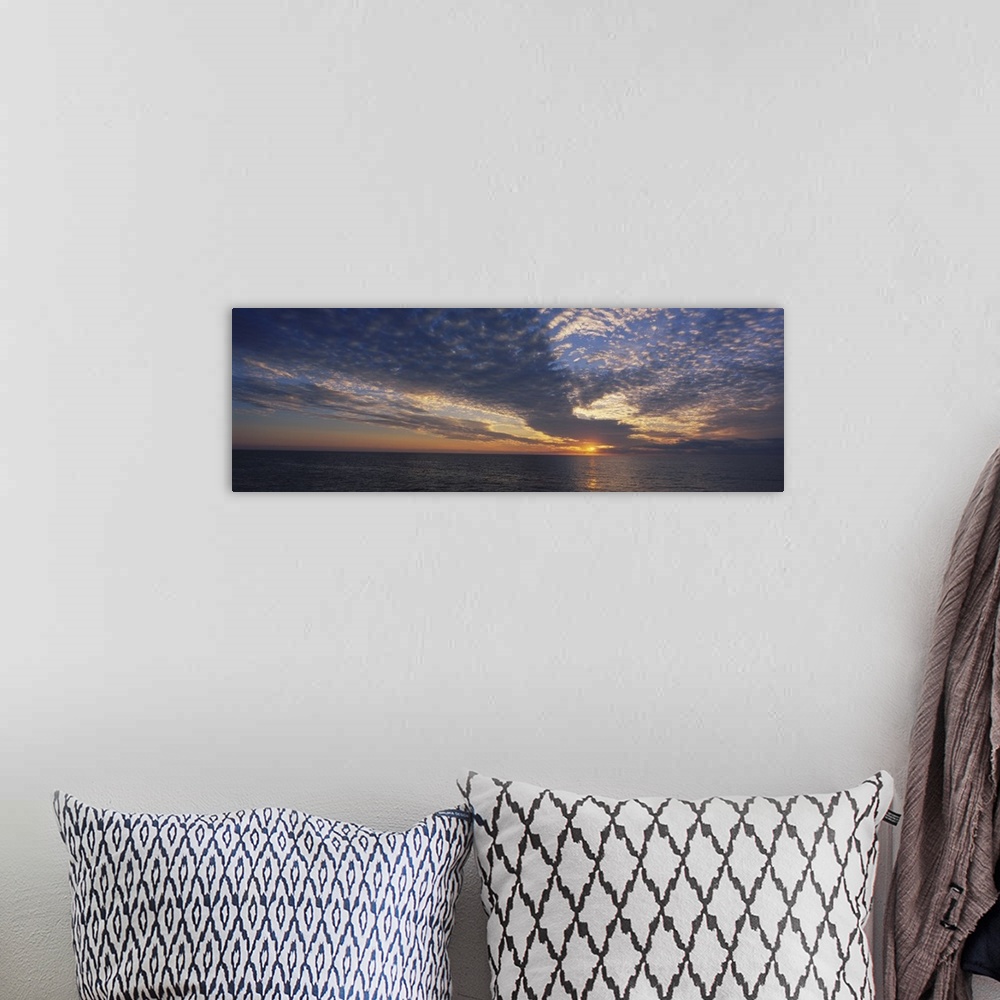 A bohemian room featuring Clouds over the sea at sunset, Venice, Florida
