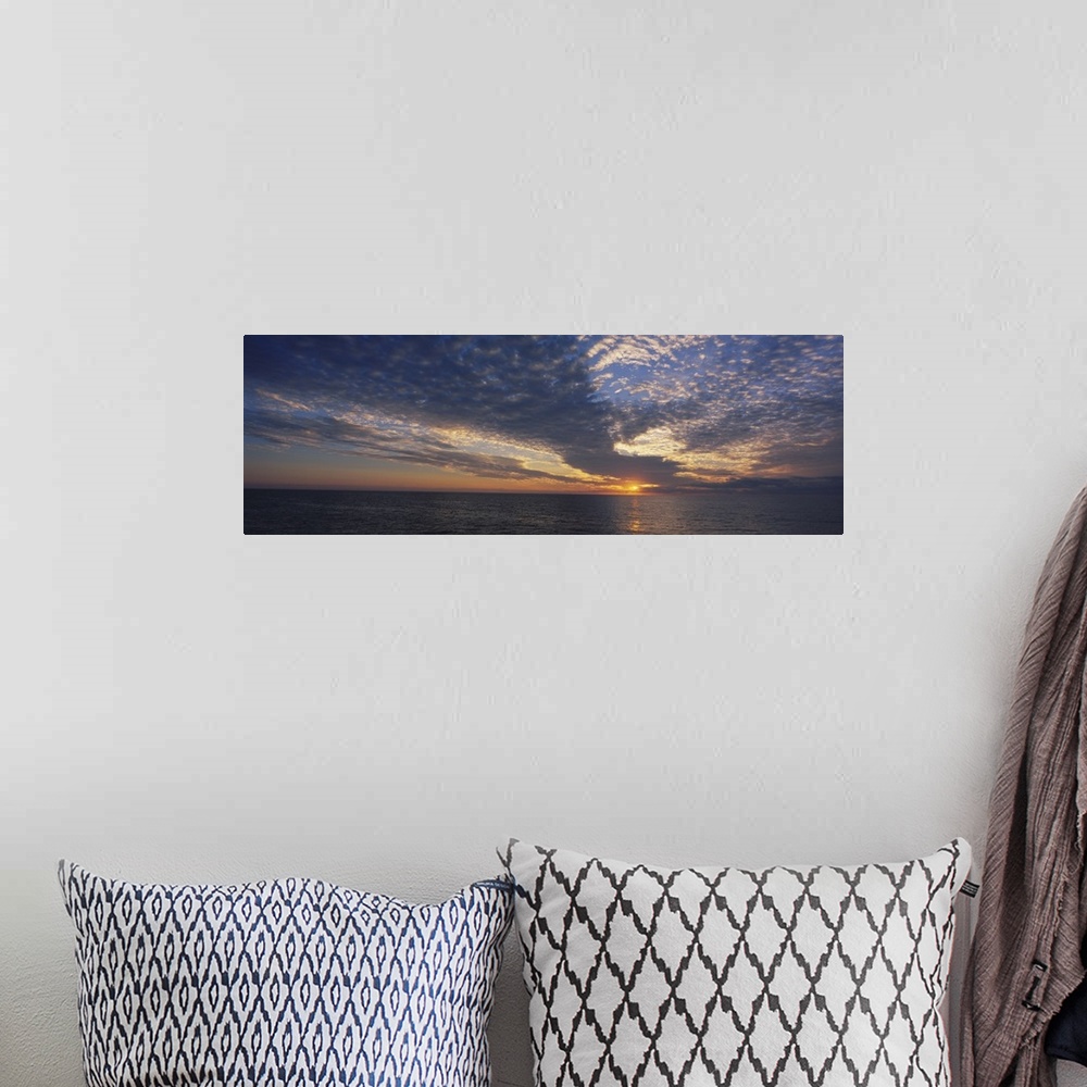 A bohemian room featuring Clouds over the sea at sunset, Venice, Florida