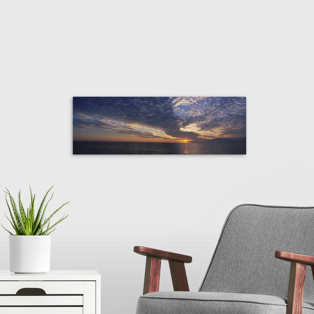 A modern room featuring Clouds over the sea at sunset, Venice, Florida