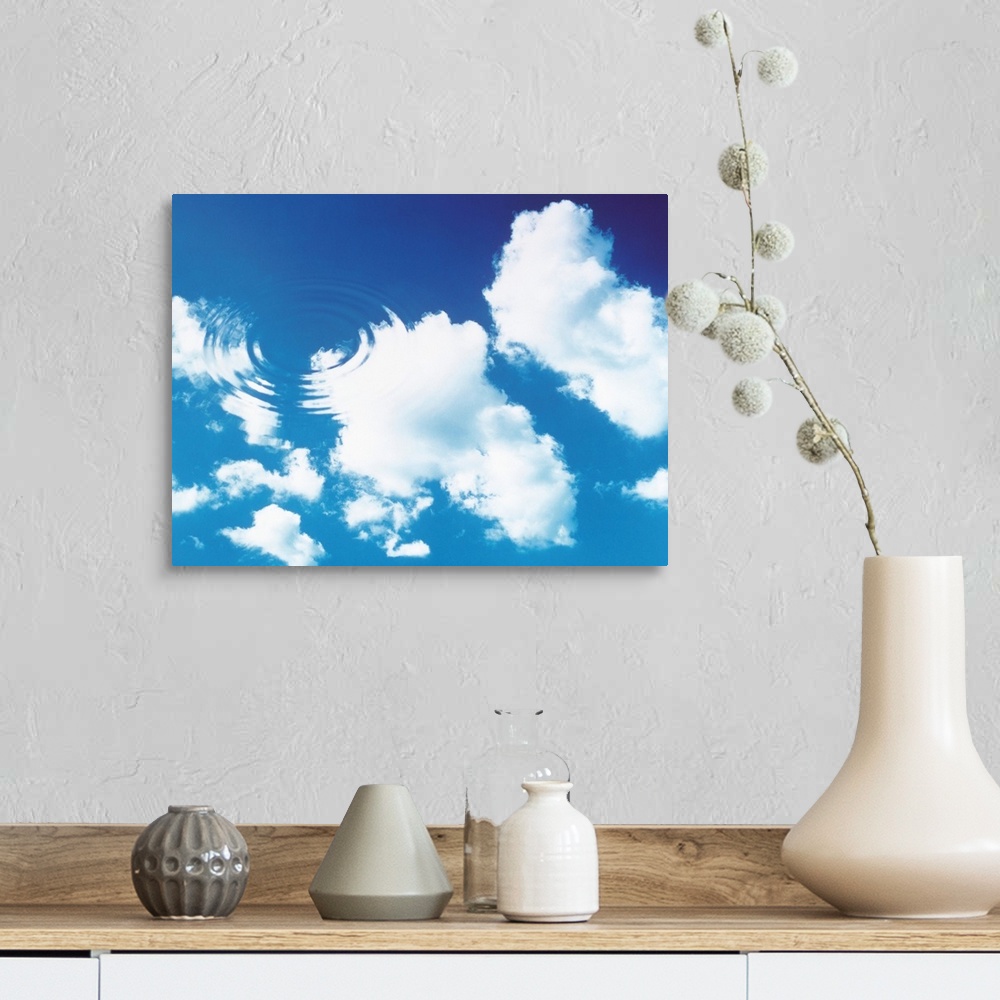A farmhouse room featuring Cloudy blue sky with water ripples