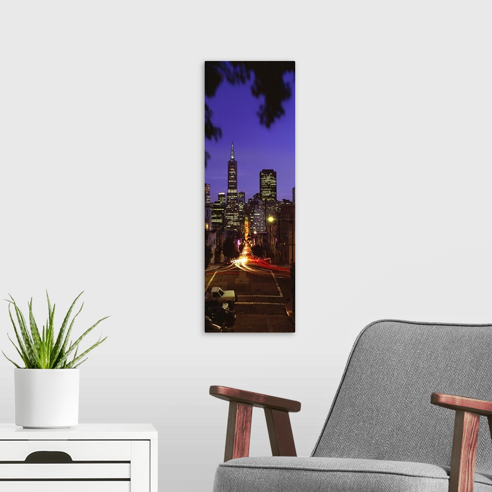 A modern room featuring Colonial building light-up at night, Transamerica Pyramid And Columbus Tower, San Francisco, Cali...