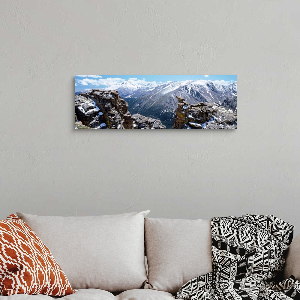 A bohemian room featuring Huge panoramic photograph of the Rocky Mountain National Park in Colorado (CO) on a sunny day. Sn...
