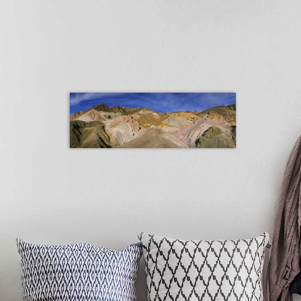 A bohemian room featuring Colorful mountains on a mountain range, Artists Palette, Death Valley National Park, California