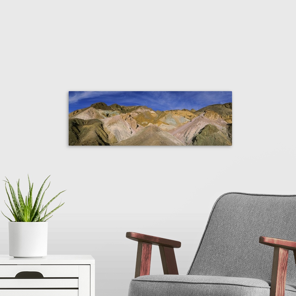 A modern room featuring Colorful mountains on a mountain range, Artists Palette, Death Valley National Park, California