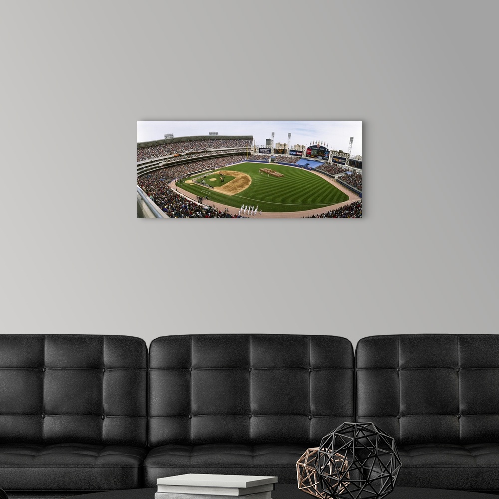 A modern room featuring Large image print of a packed baseball stadium in Illinois with a game about to start.