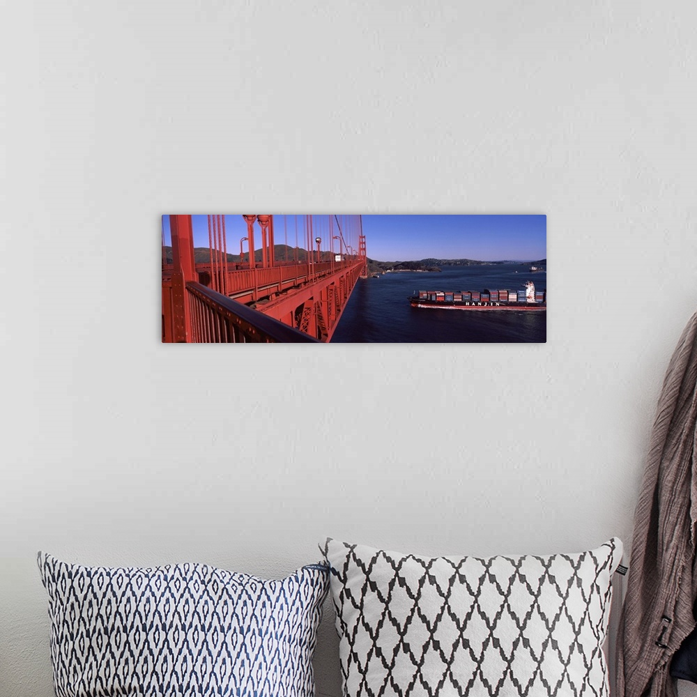 A bohemian room featuring Container ship passing under a suspension bridge Golden Gate Bridge San Francisco Bay San Francis...