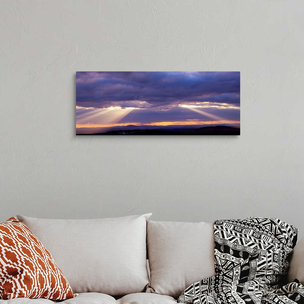 A bohemian room featuring Corpuscular Rays Clouds Sunset