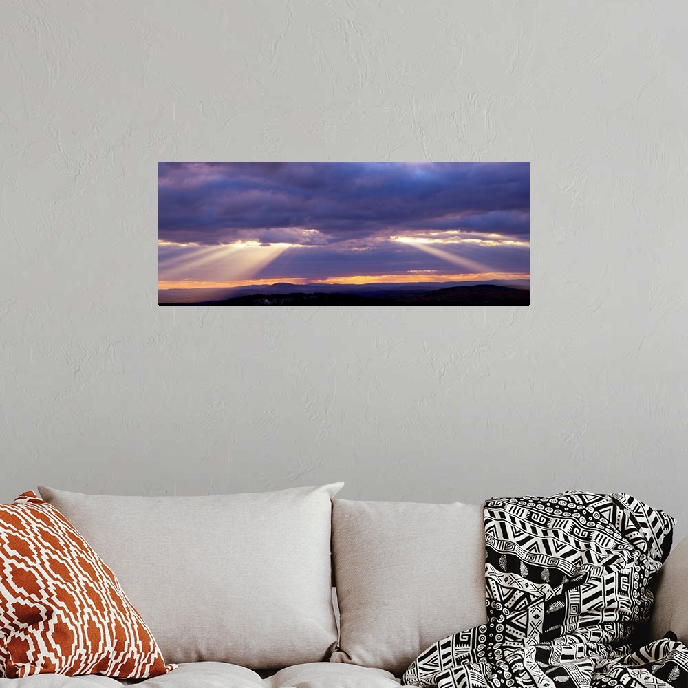 A bohemian room featuring Corpuscular Rays Clouds Sunset