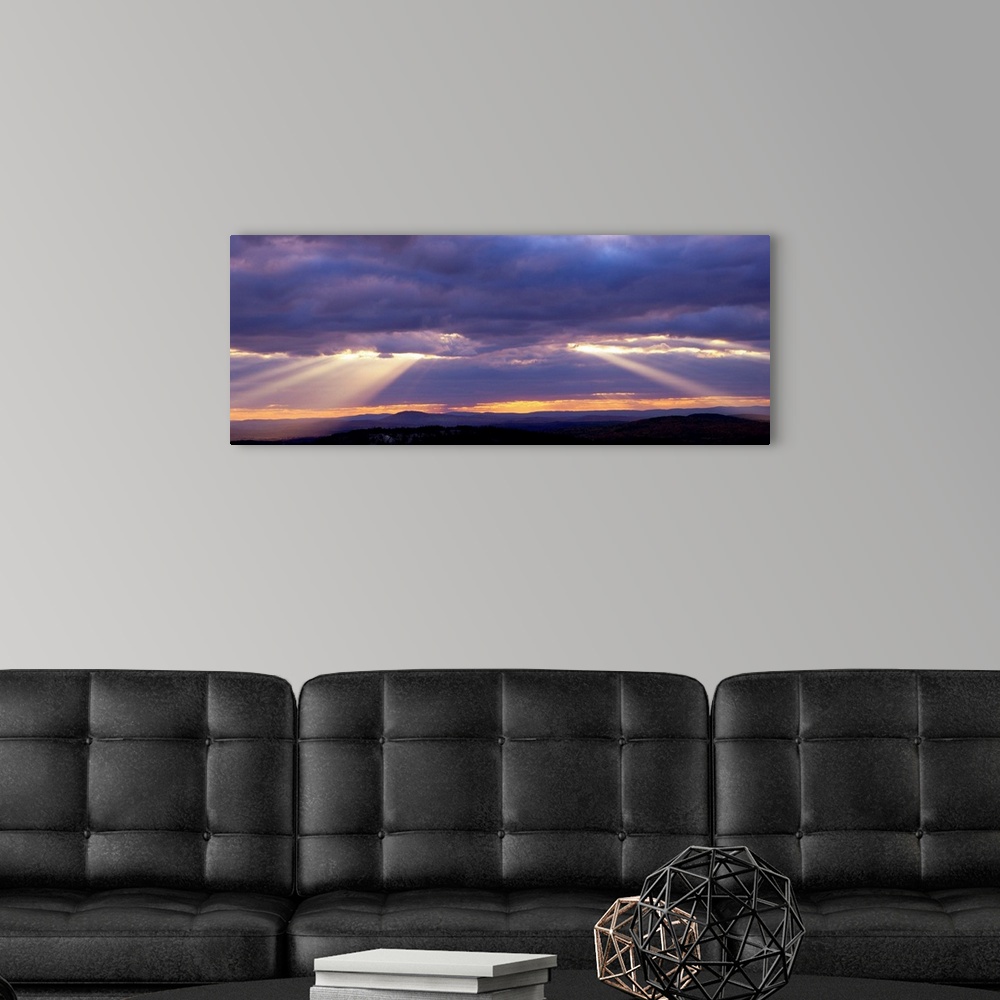 A modern room featuring Corpuscular Rays Clouds Sunset
